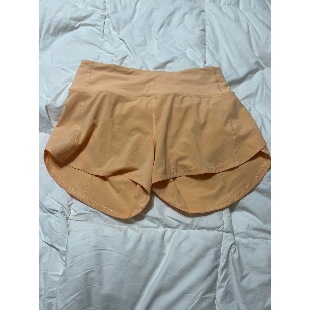 Lululemon Speed Up Mid-Rise Lined Short 4"
Summer Glow Size 6